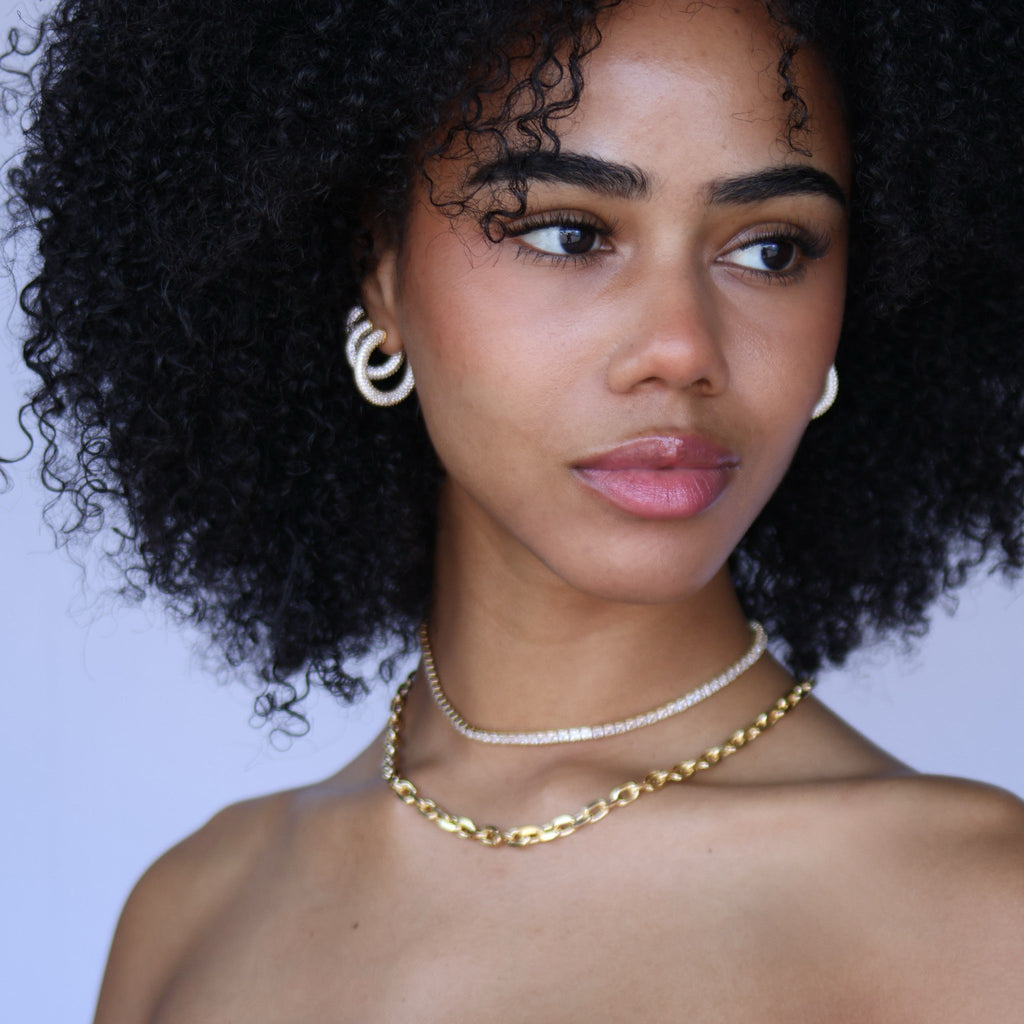 C-Shaped Iced Out Earrings with Micro CZ Stones – Luxury Statement Hoops.