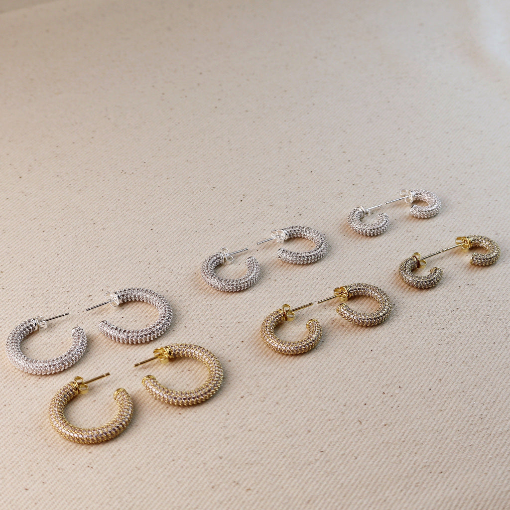 C-Shaped Iced Out Earrings with Micro CZ Stones – Luxury Statement Hoops.