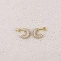 C-Shaped Iced Out Earrings with Micro CZ Stones – Luxury Statement Hoops.