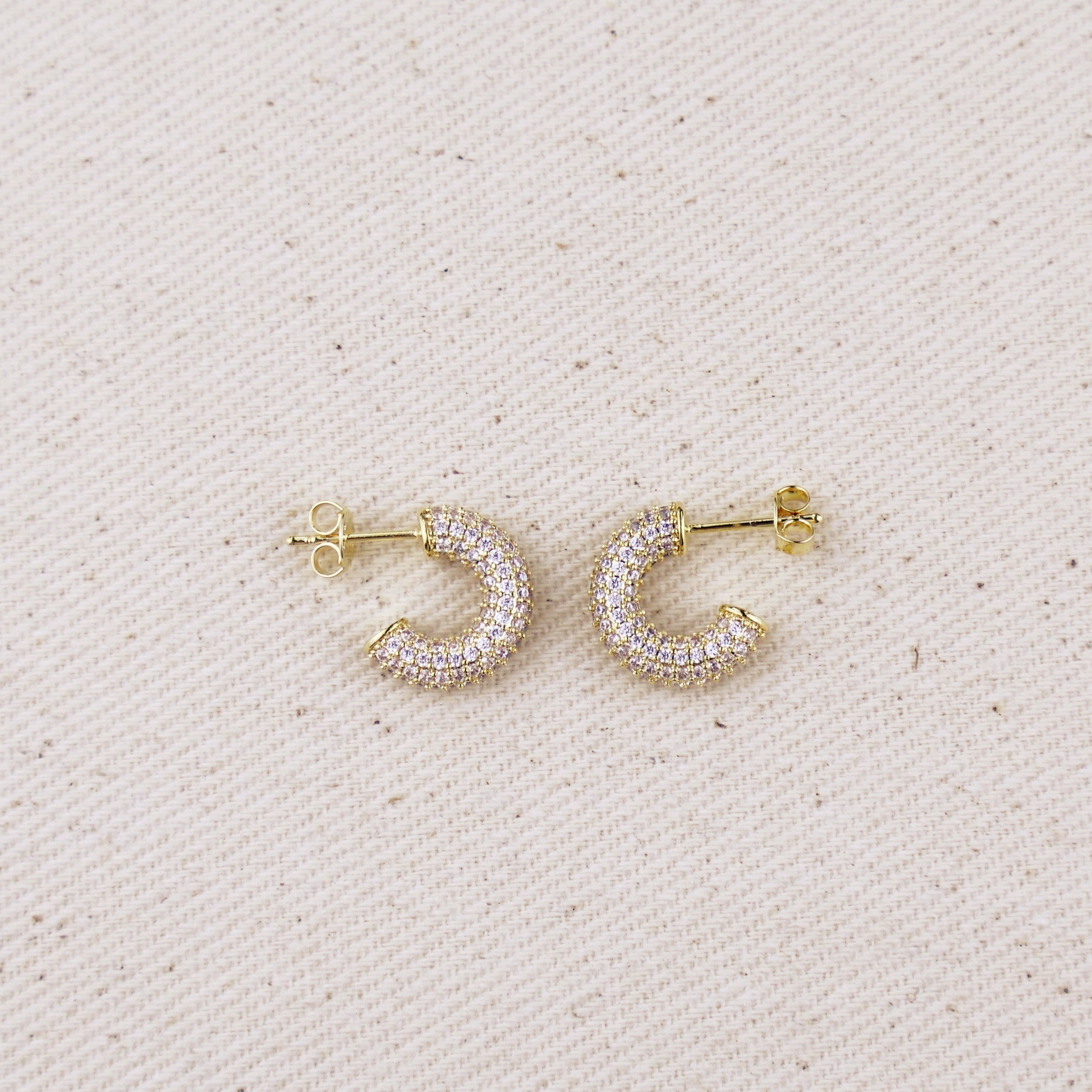 C-Shaped Iced Out Earrings with Micro CZ Stones – Luxury Statement Hoops.