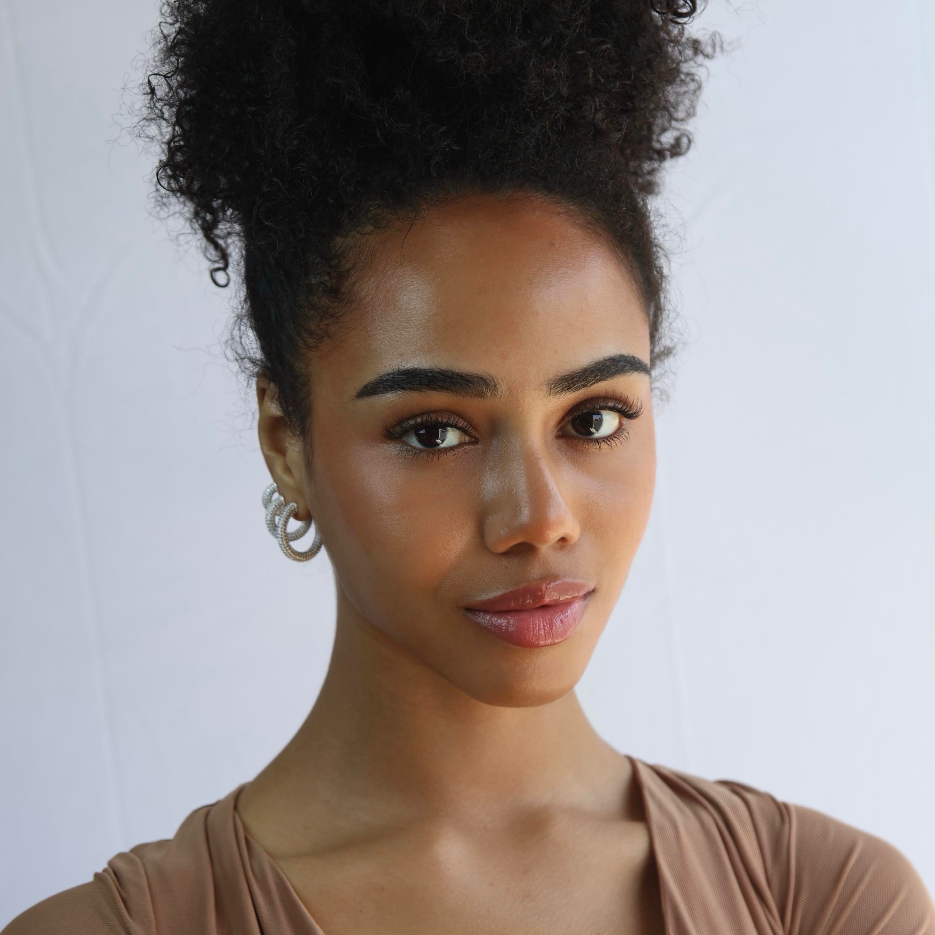 C-Shaped Iced Out Earrings with Micro CZ Stones – Luxury Statement Hoops.